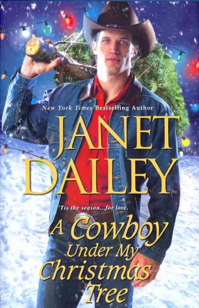 A cowboy under my Christmas tree / Janet Dailey.