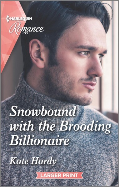 Snowbound with the brooding billionaire [large print] / Kate Hardy.